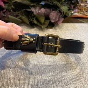 Linea Pelle belt with bumble bees around the belt.